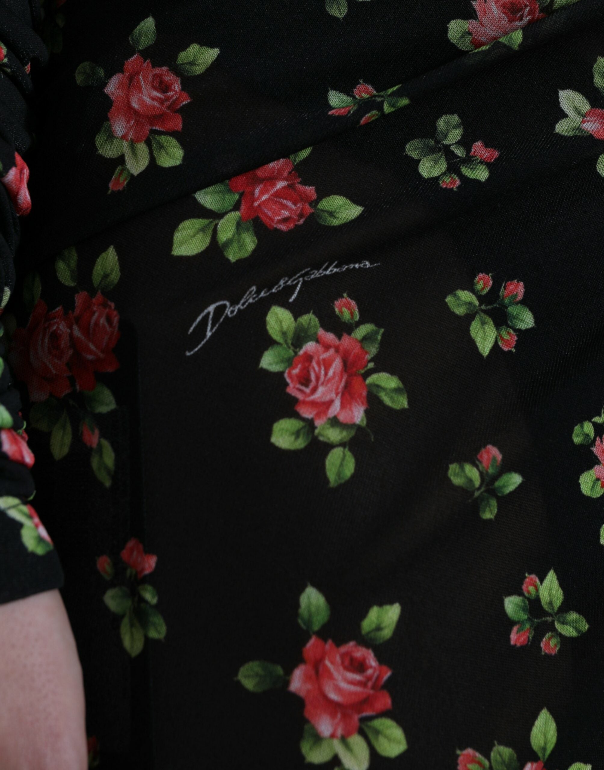 Black floral cut-out sheath long maxi dress by Dolce & Gabbana, featuring a fitted silhouette and elegant floral details.