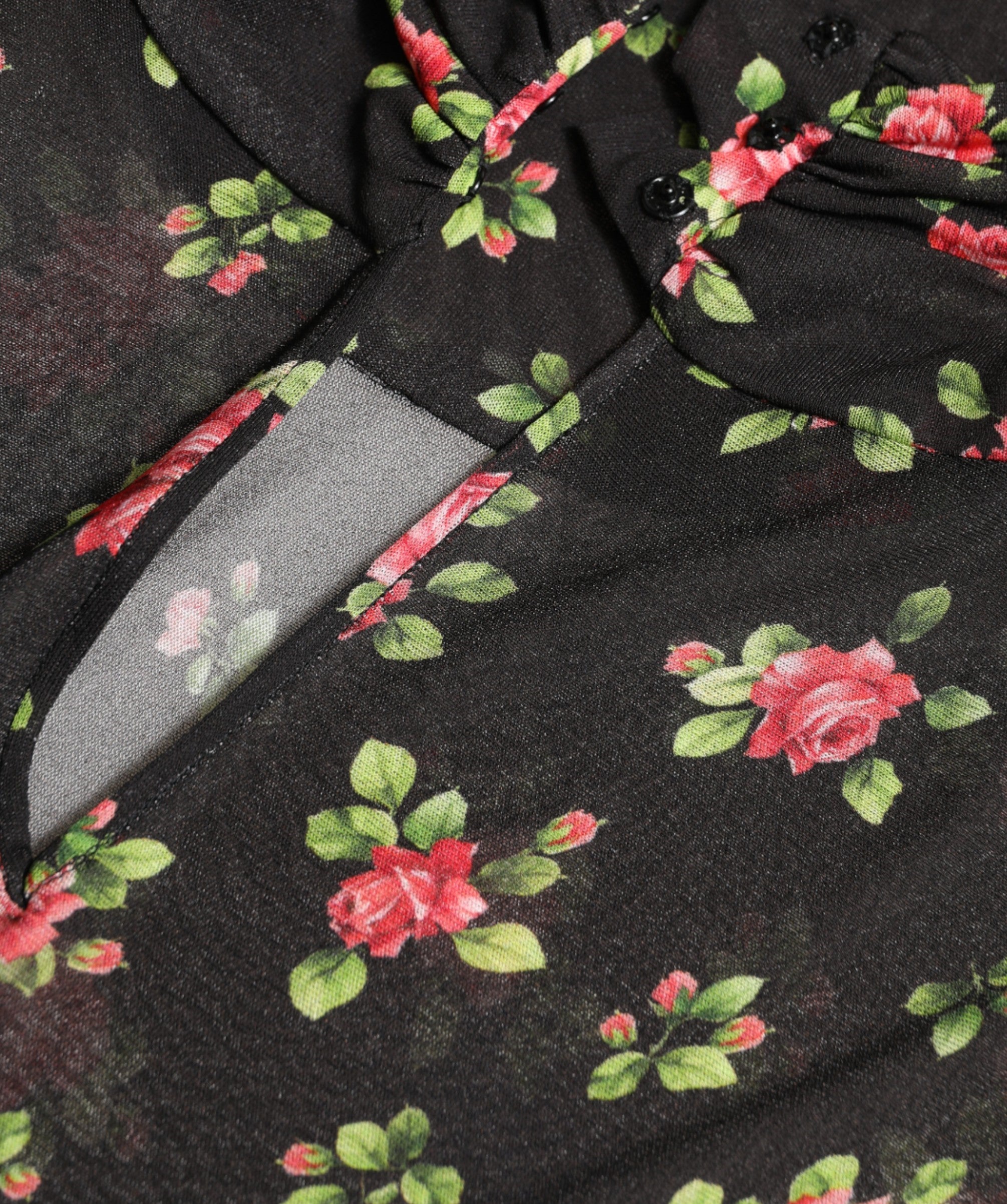 Black floral cut-out sheath maxi dress by Dolce & Gabbana featuring a fitted silhouette and elegant floral details.