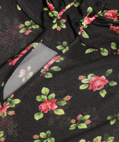 Black floral cut-out sheath maxi dress by Dolce & Gabbana featuring a fitted silhouette and elegant floral details.