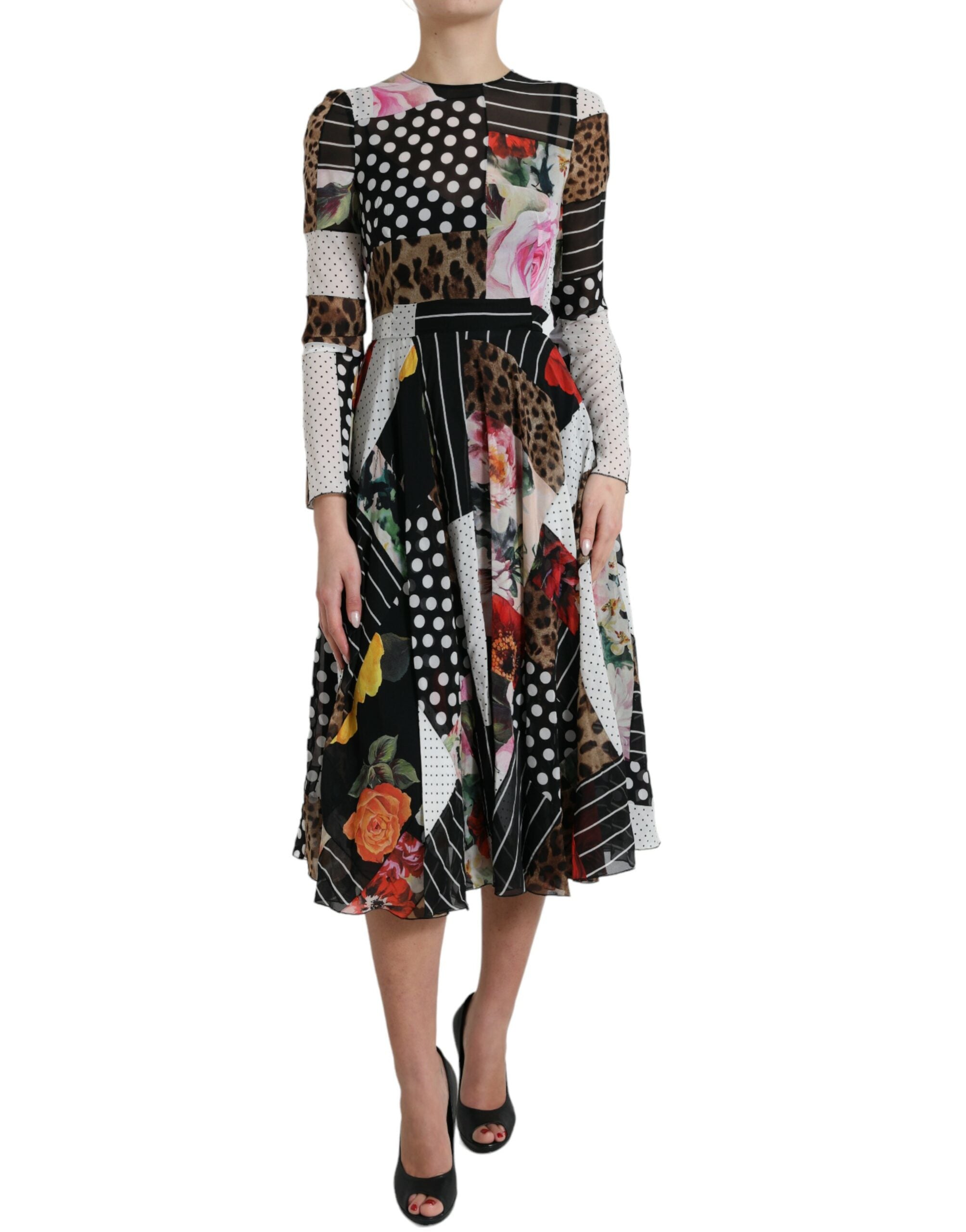 Multicolor patchwork floral leopard print Dolce & Gabbana dress displayed on a hanger, showcasing vibrant patterns and intricate fabric details.
