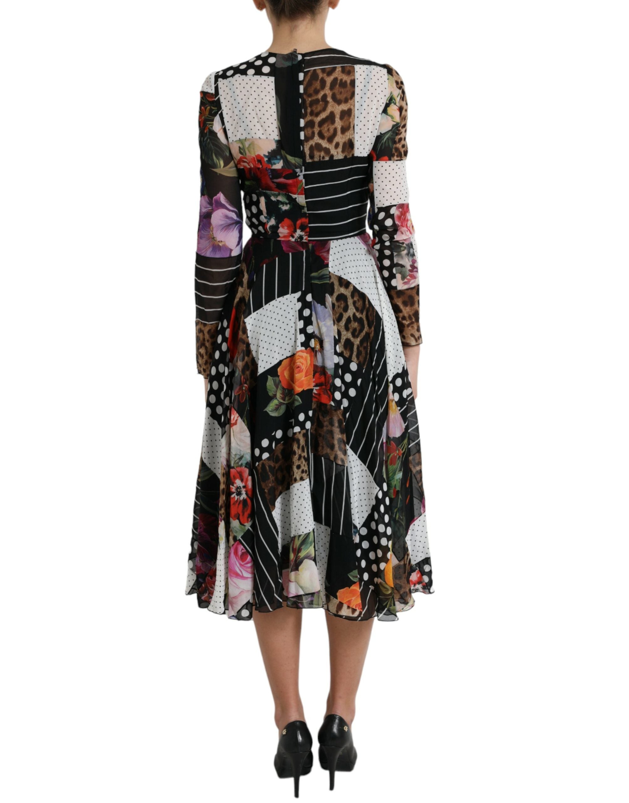 Multicolor patchwork floral and leopard print dress by Dolce & Gabbana, featuring vibrant patterns and a stylish design.