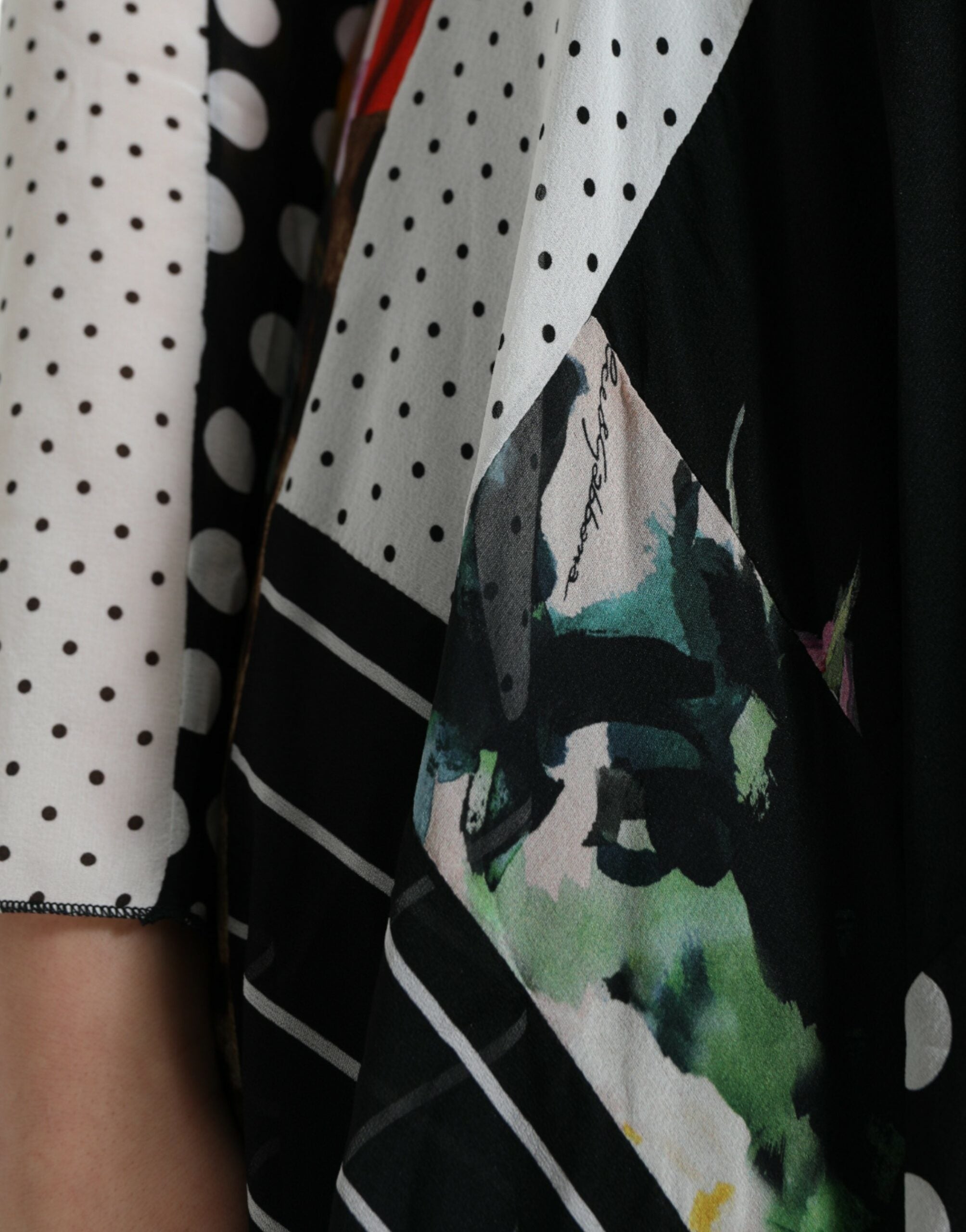 Multicolor patchwork floral leopard print dress by Dolce & Gabbana, featuring vibrant fabric and stylish design.