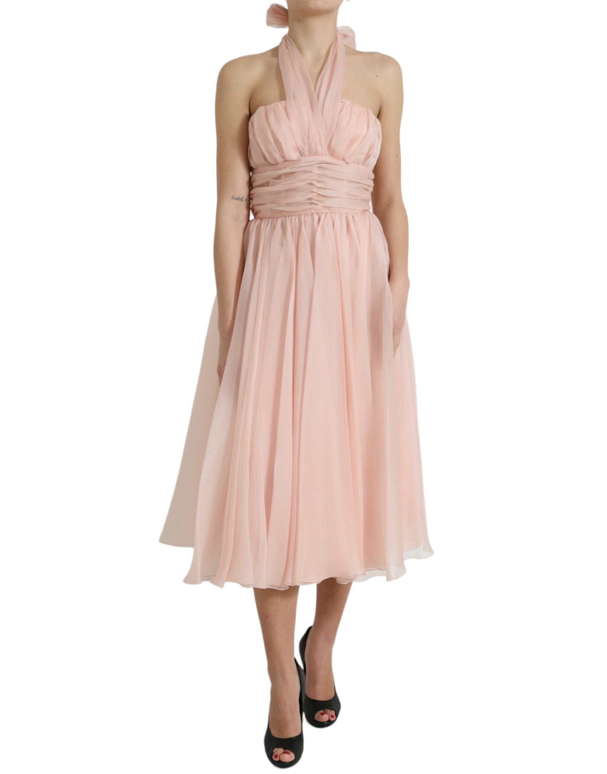 Pink silk chiffon halter A-line pleated midi dress by Dolce & Gabbana, featuring flowing fabric and elegant design.