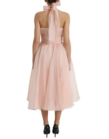 Pink silk chiffon halter A-line pleated midi dress by Dolce & Gabbana, featuring flowing fabric and elegant design.