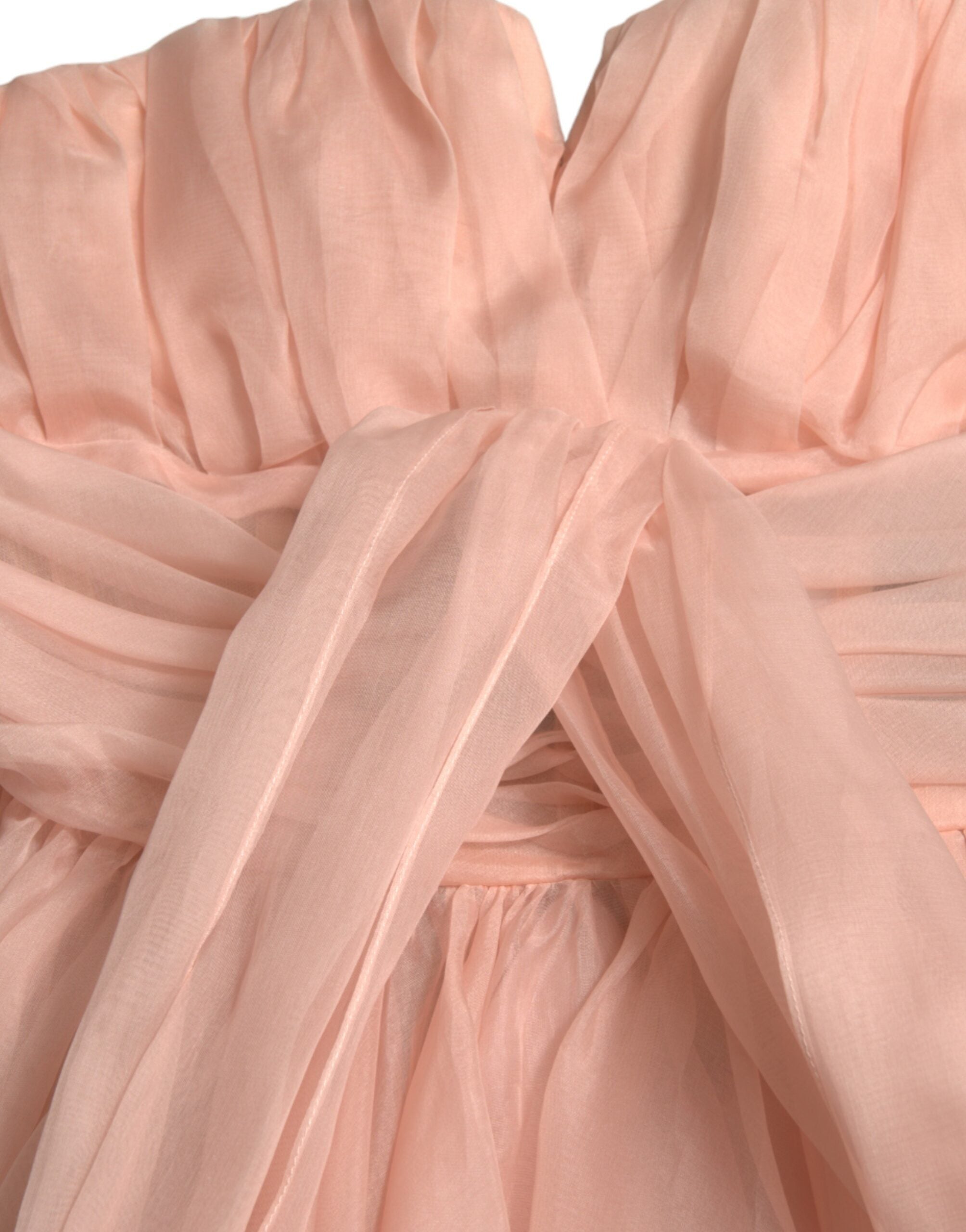 Pink silk chiffon halter A-line pleated midi dress by Dolce & Gabbana, featuring elegant flowing fabric and a stylish halter neckline.