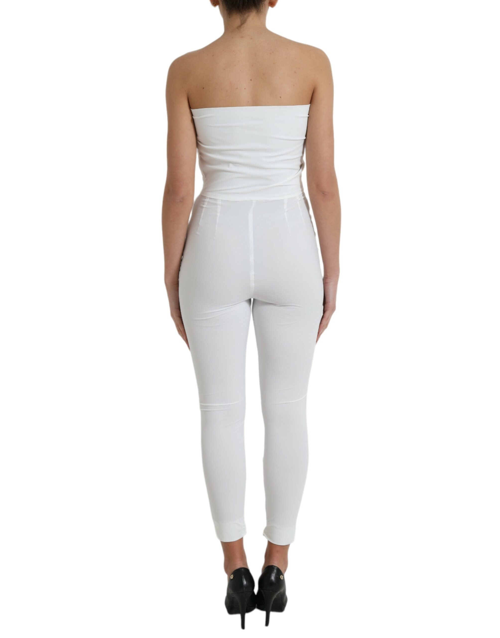 White nylon strapless bodycon jumpsuit dress by Dolce & Gabbana, fitted silhouette with sleek, smooth fabric.