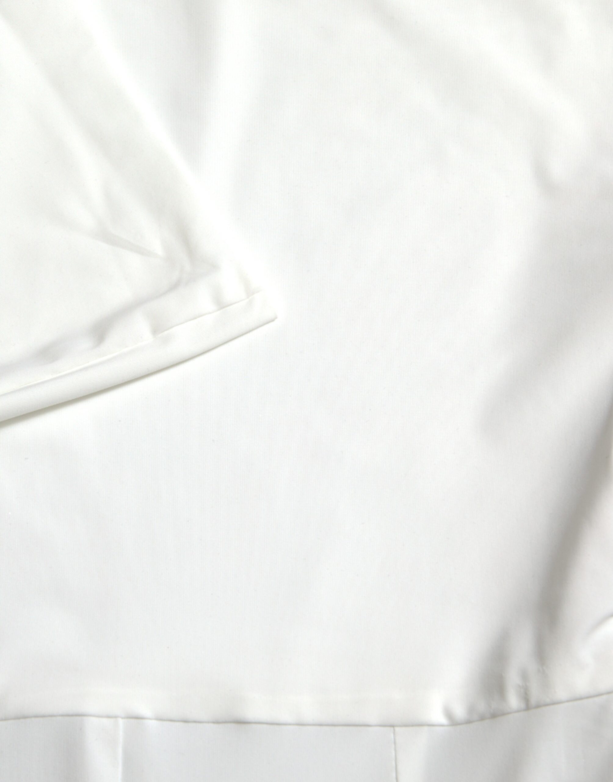 White nylon strapless bodycon jumpsuit dress by Dolce & Gabbana, featuring a fitted design and sleek, modern style.