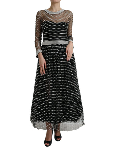 Black crystal-embellished Dolce & Gabbana A-line gown dress with intricate detailing and elegant flowing fabric.