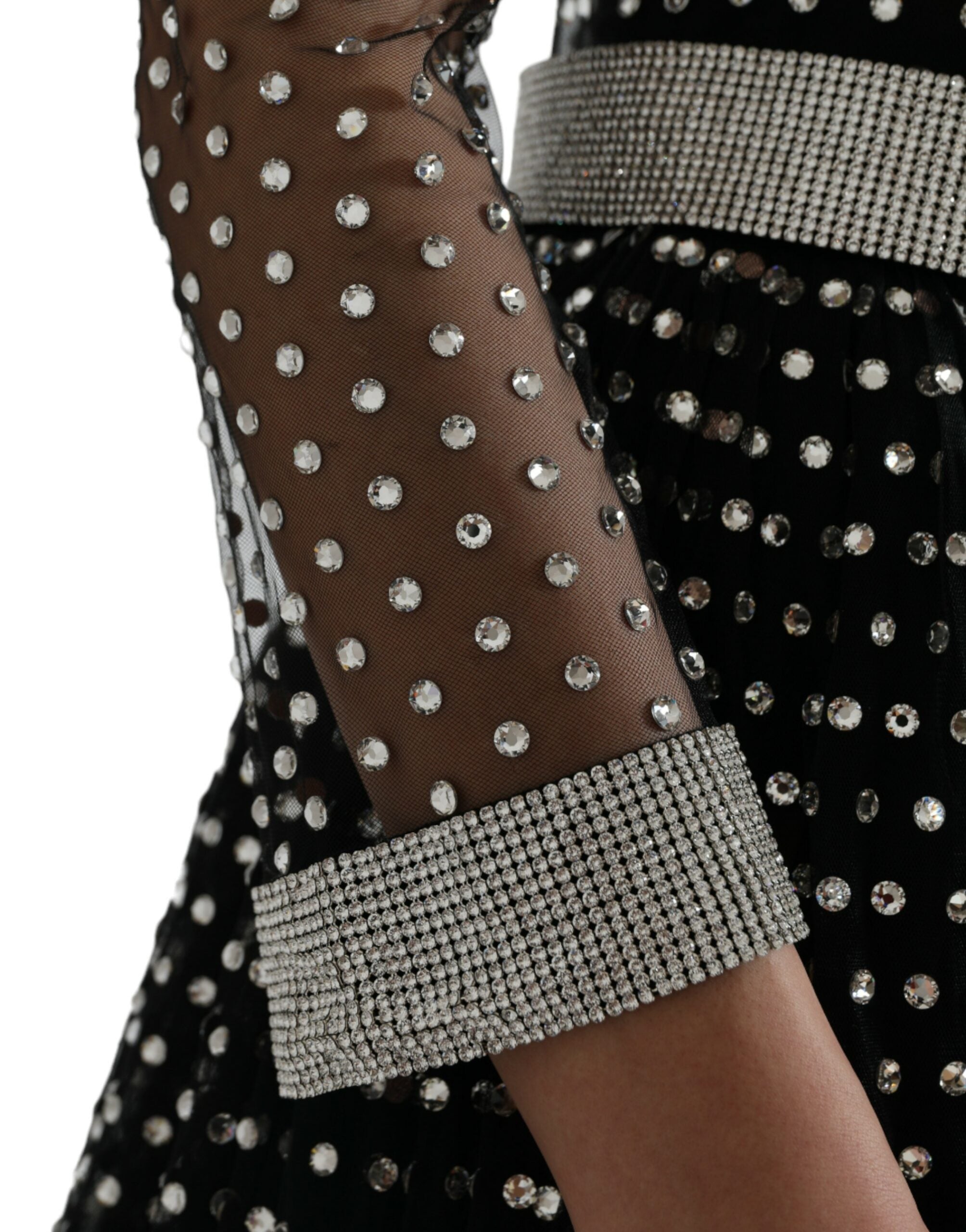 Black crystal-embellished A-line gown dress by Dolce & Gabbana, featuring elegant flowing fabric and intricate crystal details.