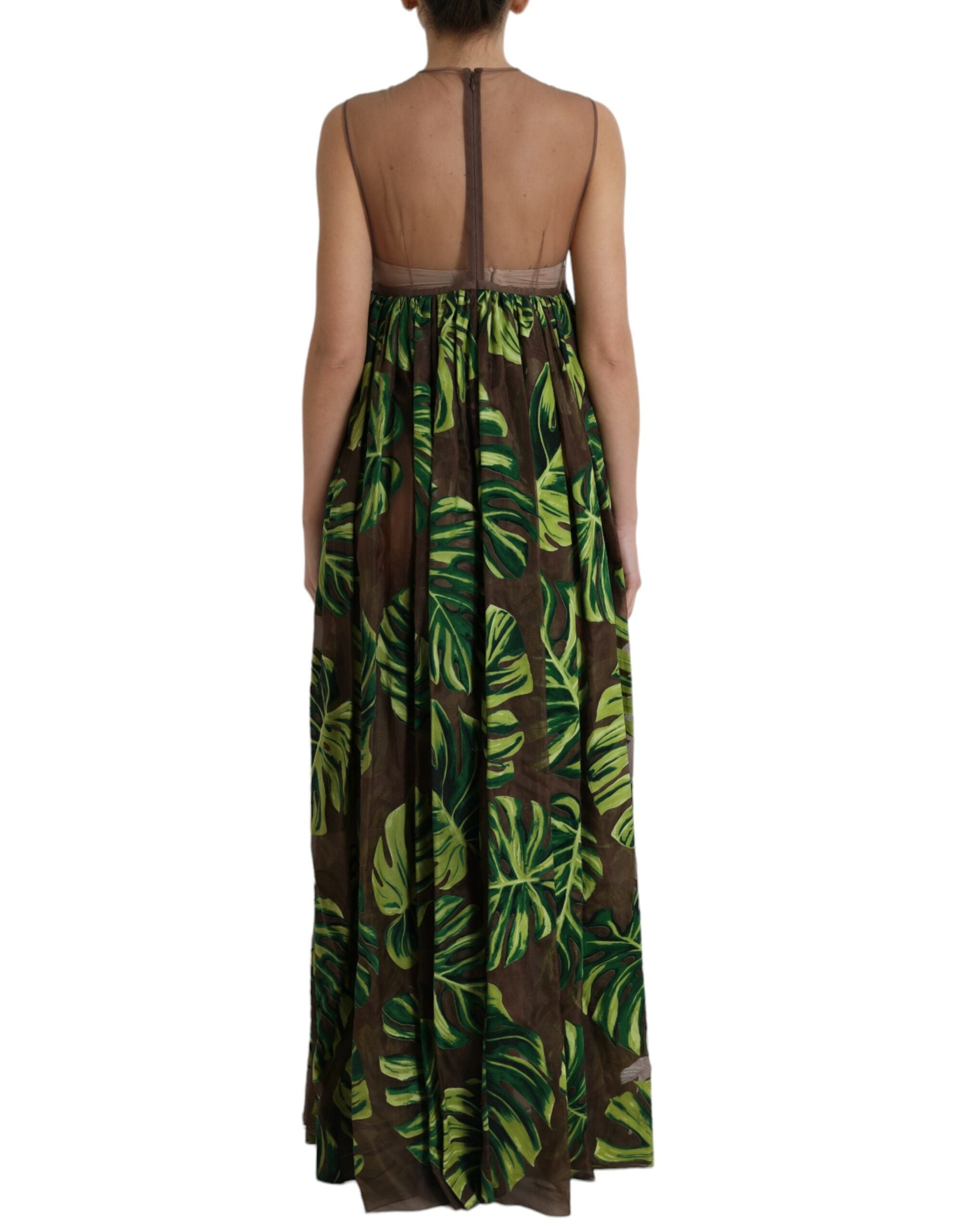 Green banana leaf print sleeveless maxi dress by Dolce & Gabbana, featuring a flowing long silhouette and vibrant botanical pattern.
