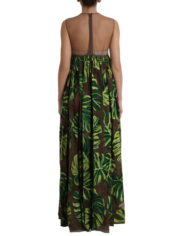 Green banana leaf print sleeveless maxi dress by Dolce & Gabbana, featuring a flowing long silhouette and vibrant botanical pattern.