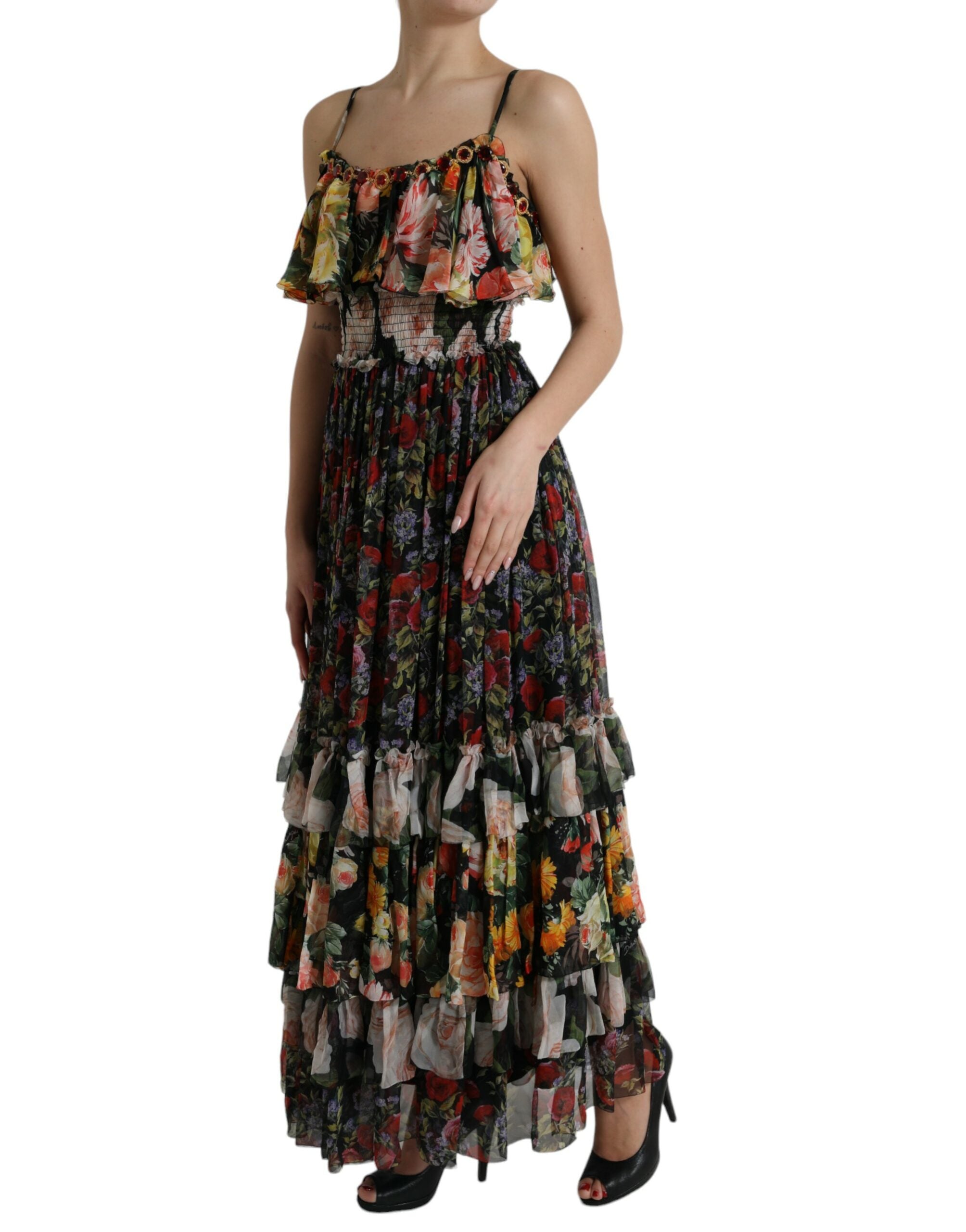 Multicolor floral chiffon tiered maxi dress by Dolce & Gabbana displayed on a model. Light, flowing fabric with vibrant floral patterns.