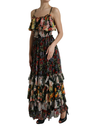Multicolor floral chiffon tiered maxi dress by Dolce & Gabbana displayed on a model. Light, flowing fabric with vibrant floral patterns.