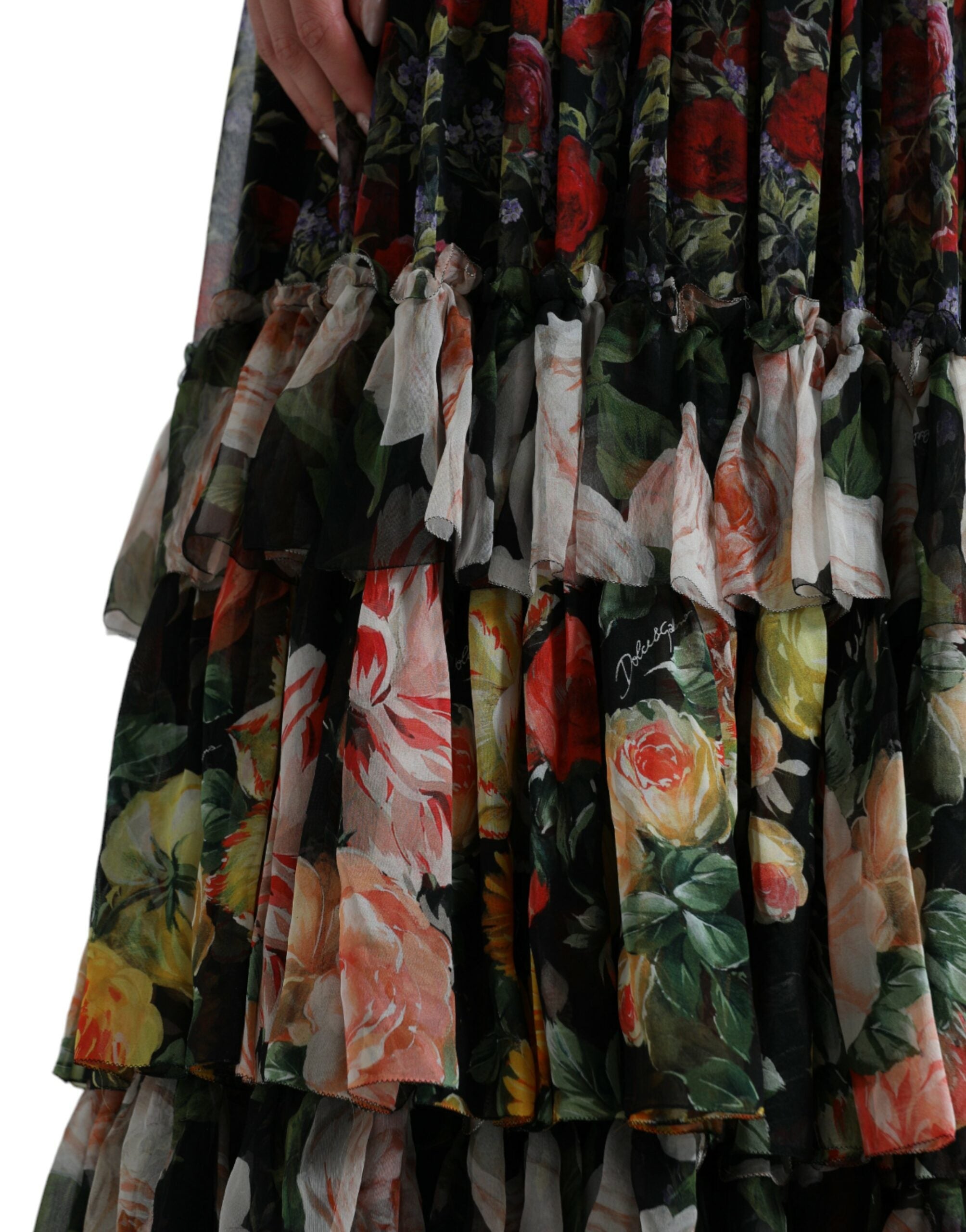 Multicolor floral chiffon tiered maxi dress by Dolce & Gabbana displayed on a model, featuring flowing fabric and vibrant floral patterns.