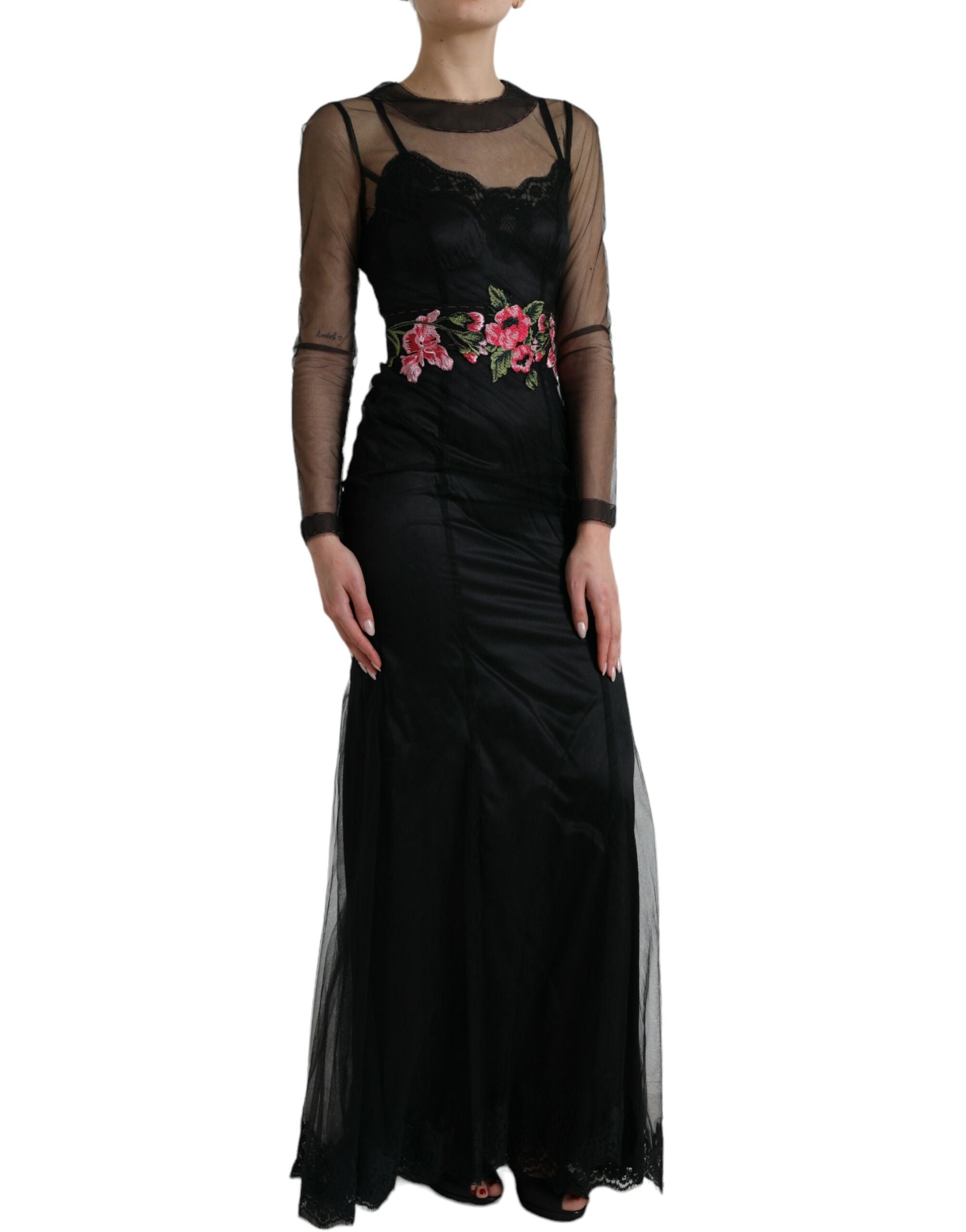 Black floral embroidery mesh tulle gown dress by Dolce & Gabbana, featuring intricate floral embroidery and a flowing silhouette.
