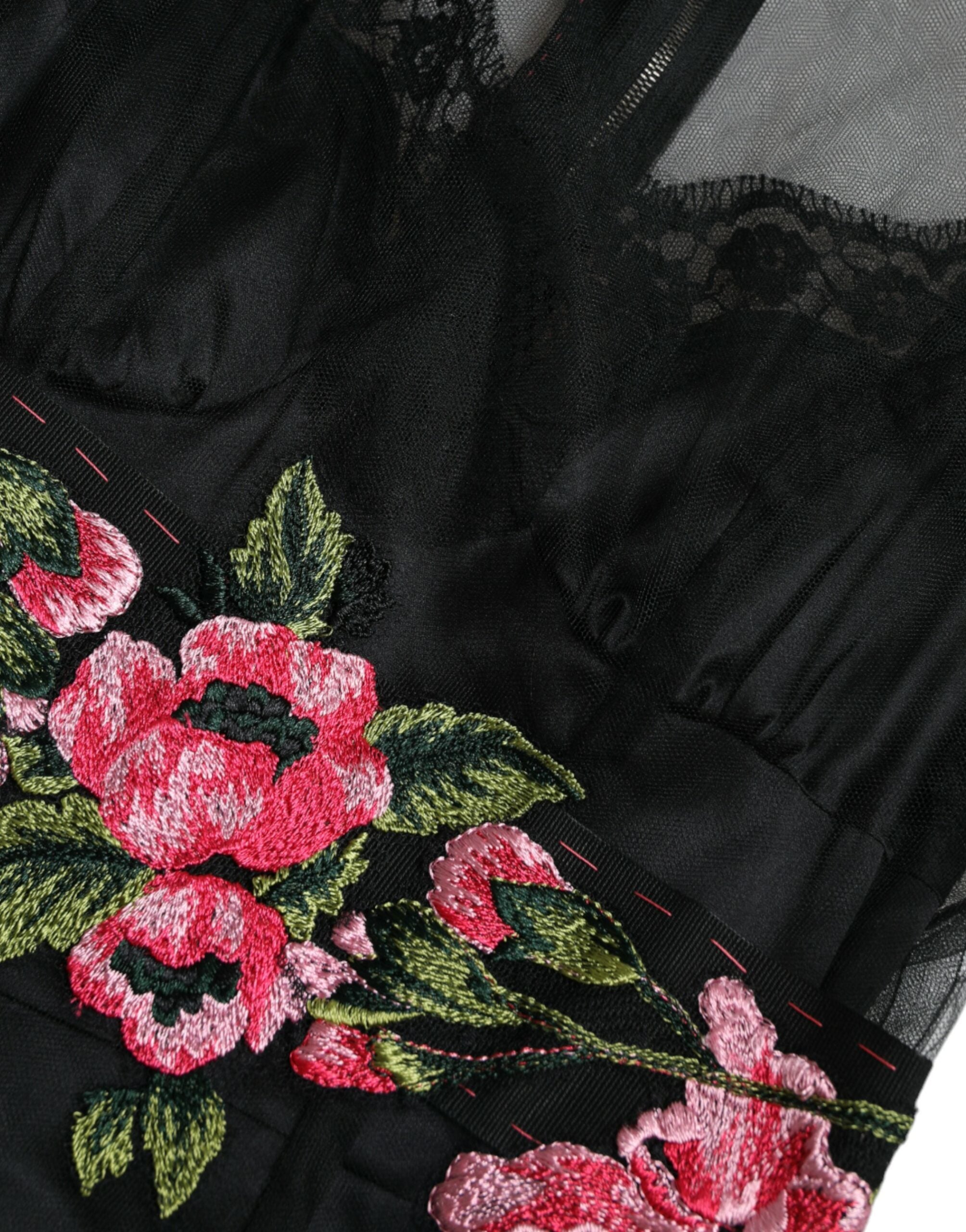 Black floral embroidery mesh tulle gown dress by Dolce & Gabbana with intricate floral embroidery and sheer mesh fabric.
