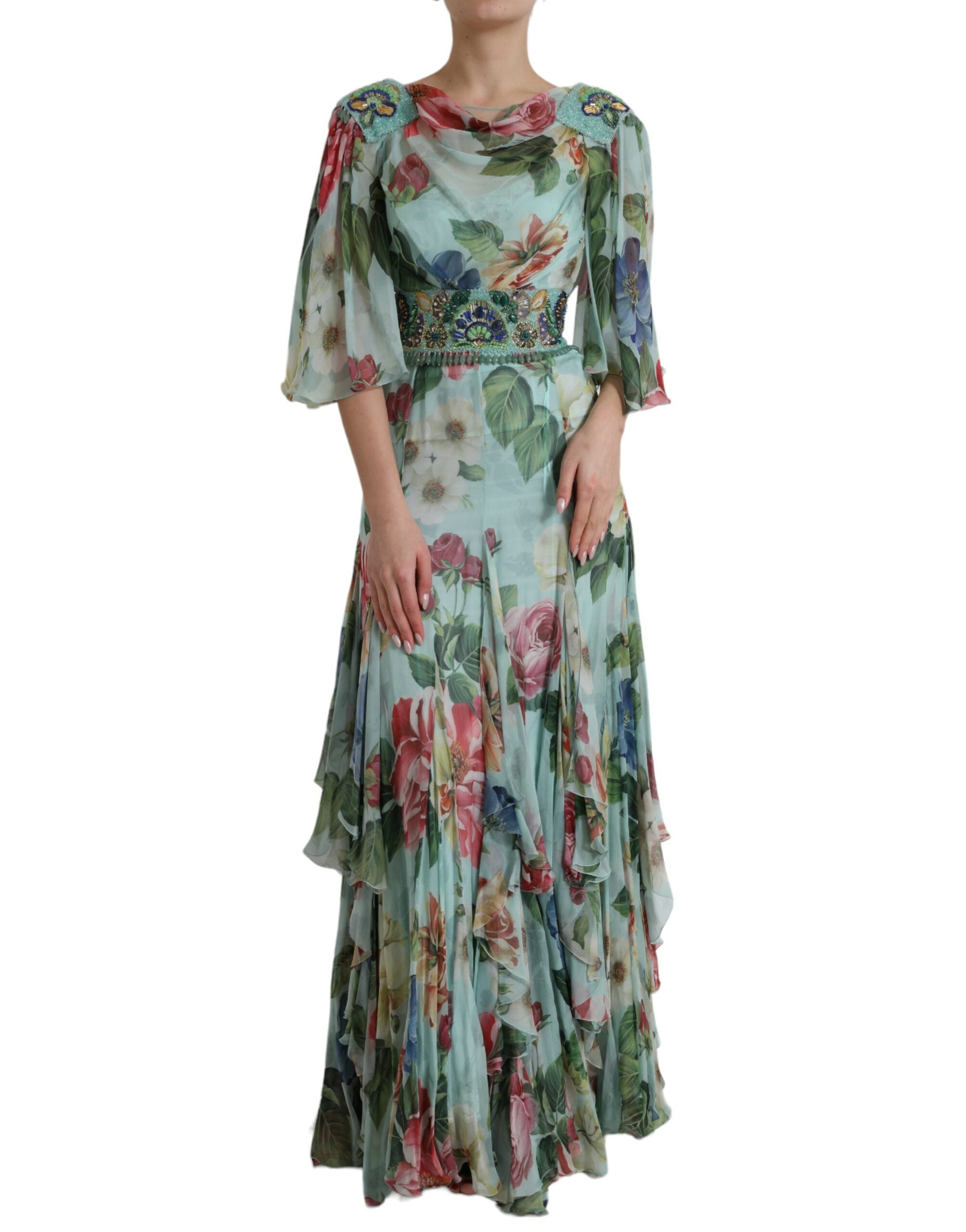 Blue floral print tiered long maxi dress by Dolce & Gabbana hanging on a clothing rack.