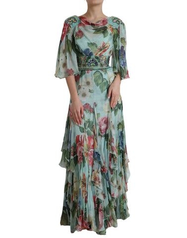 Blue floral print tiered long maxi dress by Dolce & Gabbana hanging on a clothing rack.