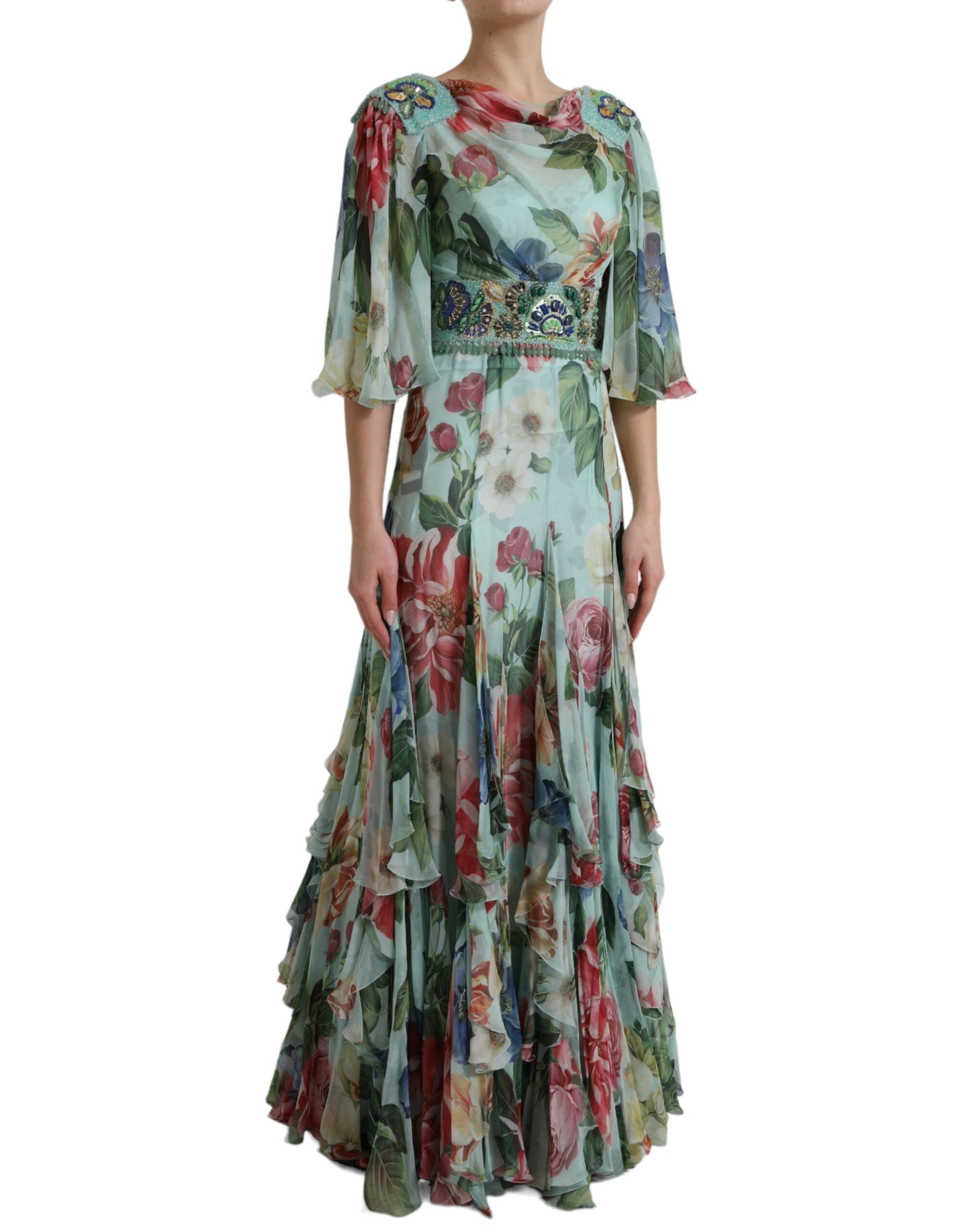 Blue floral print tiered long maxi dress by Dolce & Gabbana, featuring flowing fabric and a vibrant floral pattern.