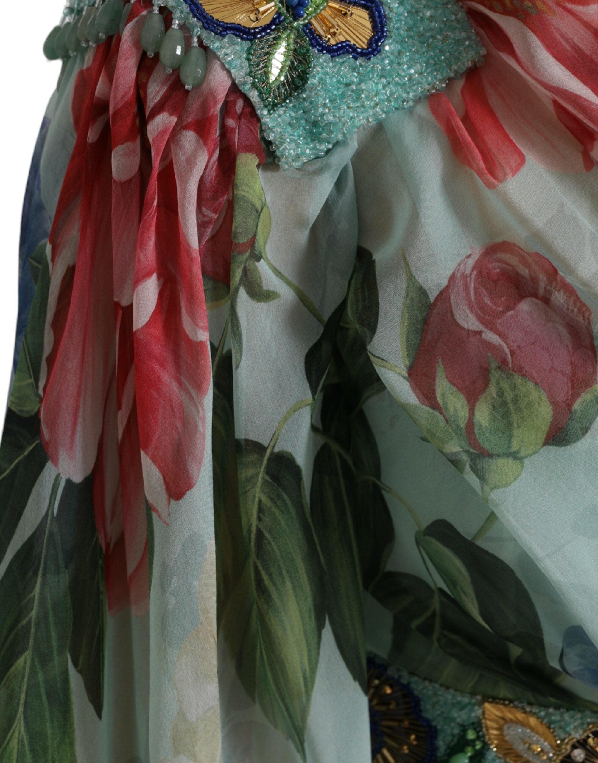 Blue floral print tiered long maxi dress by Dolce & Gabbana, flowing fabric with layered tiers and vibrant floral pattern.