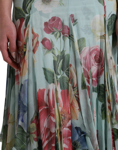 Blue floral print tiered long maxi dress by Dolce & Gabbana, featuring flowing fabric and intricate floral patterns.