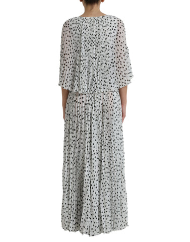 White polka dot A-line pleated maxi dress by Dolce & Gabbana, flowing fabric with a fitted waist and elegant design.