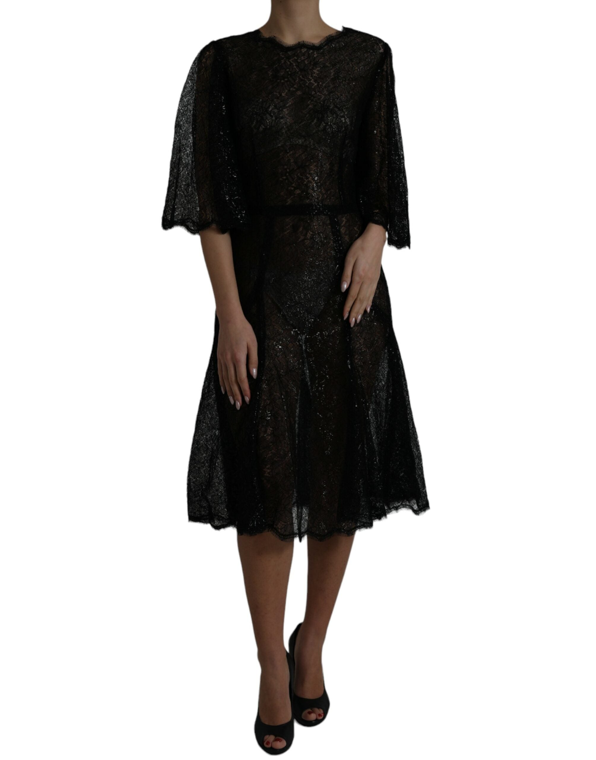 Black floral lace sheer A-line midi dress by Dolce & Gabbana, featuring intricate lace details and a flowing silhouette.