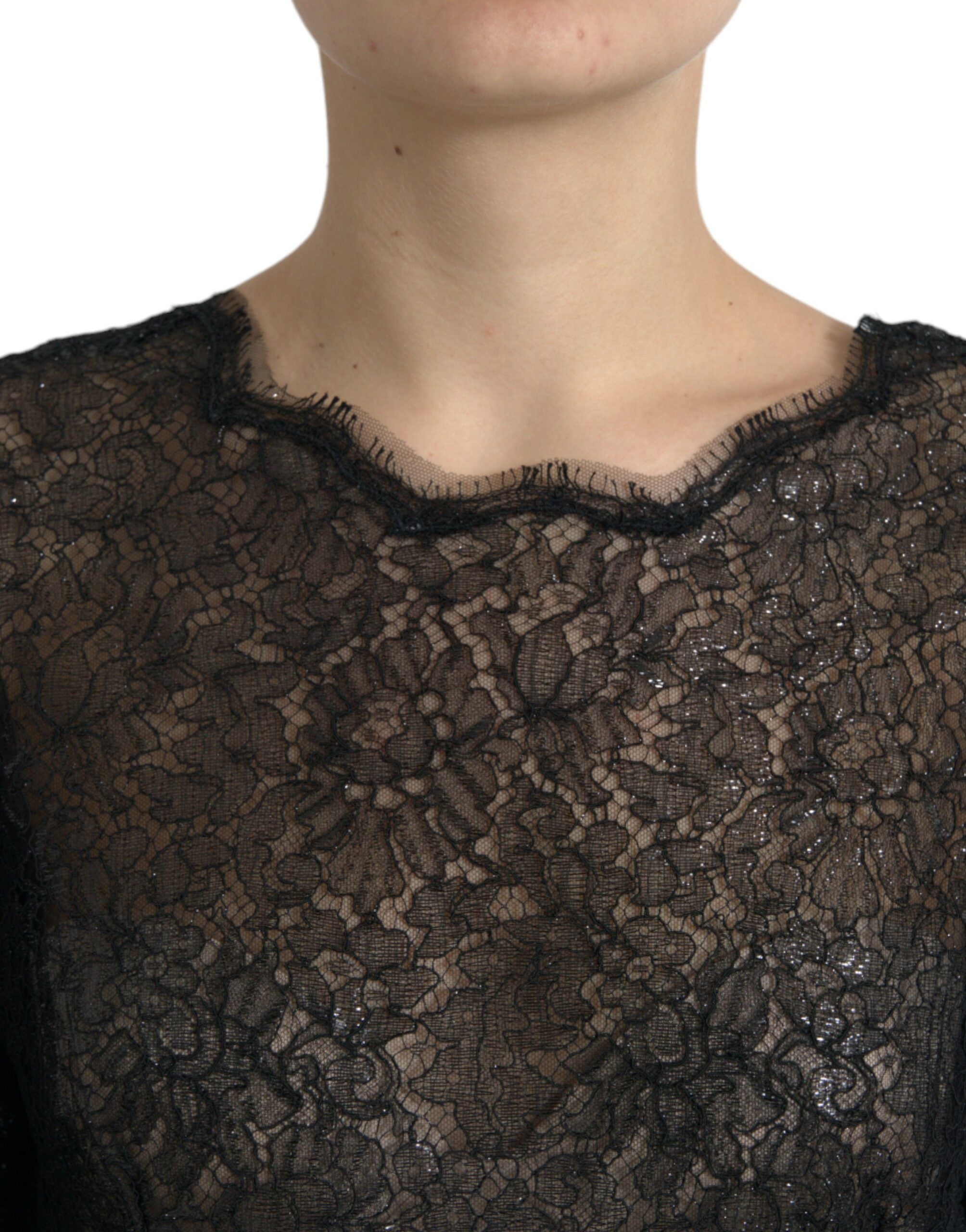 Black floral lace sheer A-line midi dress by Dolce & Gabbana, featuring intricate lace details and a flowing silhouette.