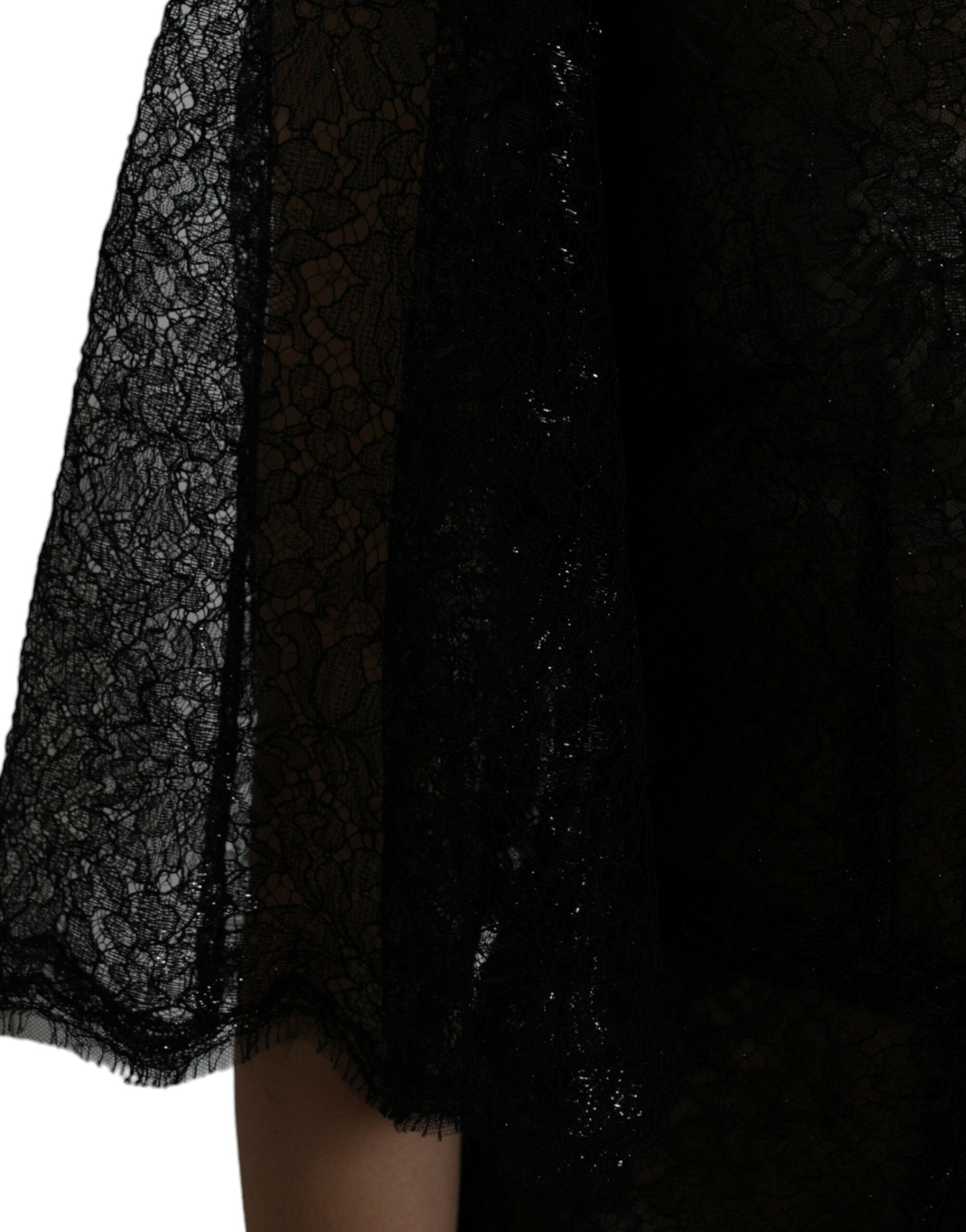 Black floral lace sheer A-line midi dress by Dolce & Gabbana, featuring intricate lace details and a flowing silhouette.