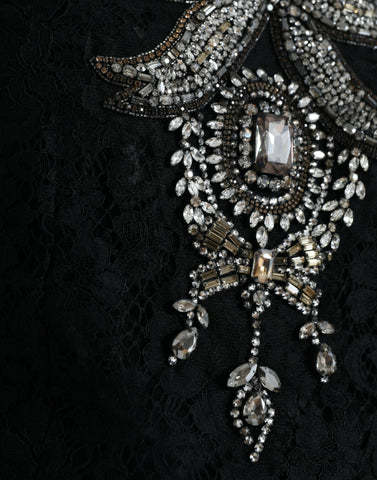 Black lace crystal-embellished sheath dress by Dolce & Gabbana, featuring intricate lace details and sparkling crystal accents.