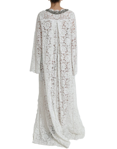 White lace shift dress with crystal embellishments by Dolce & Gabbana, showcasing intricate lace details and elegant design.