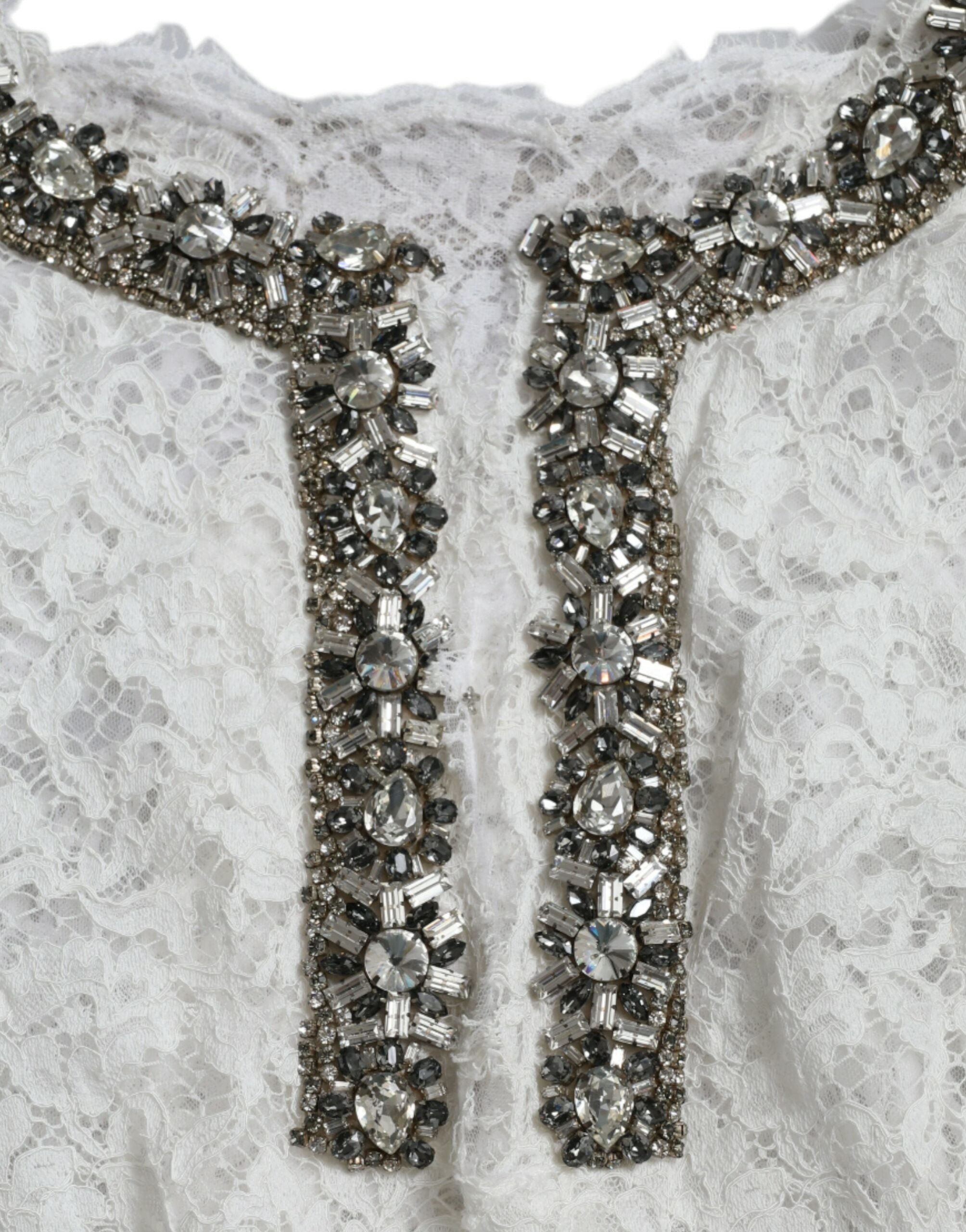 White lace shift dress with crystal embellishments by Dolce & Gabbana, featuring intricate lace details and elegant design.