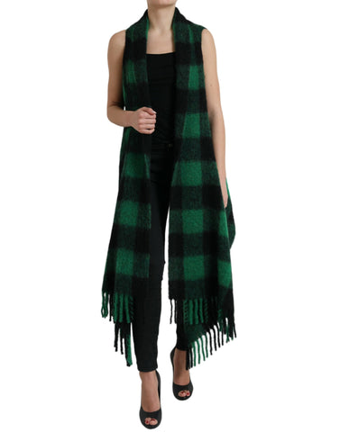 Black and green buffalo check poncho coat by Dolce & Gabbana, featuring a stylish, cozy jacket with a classic pattern and fringed edges.