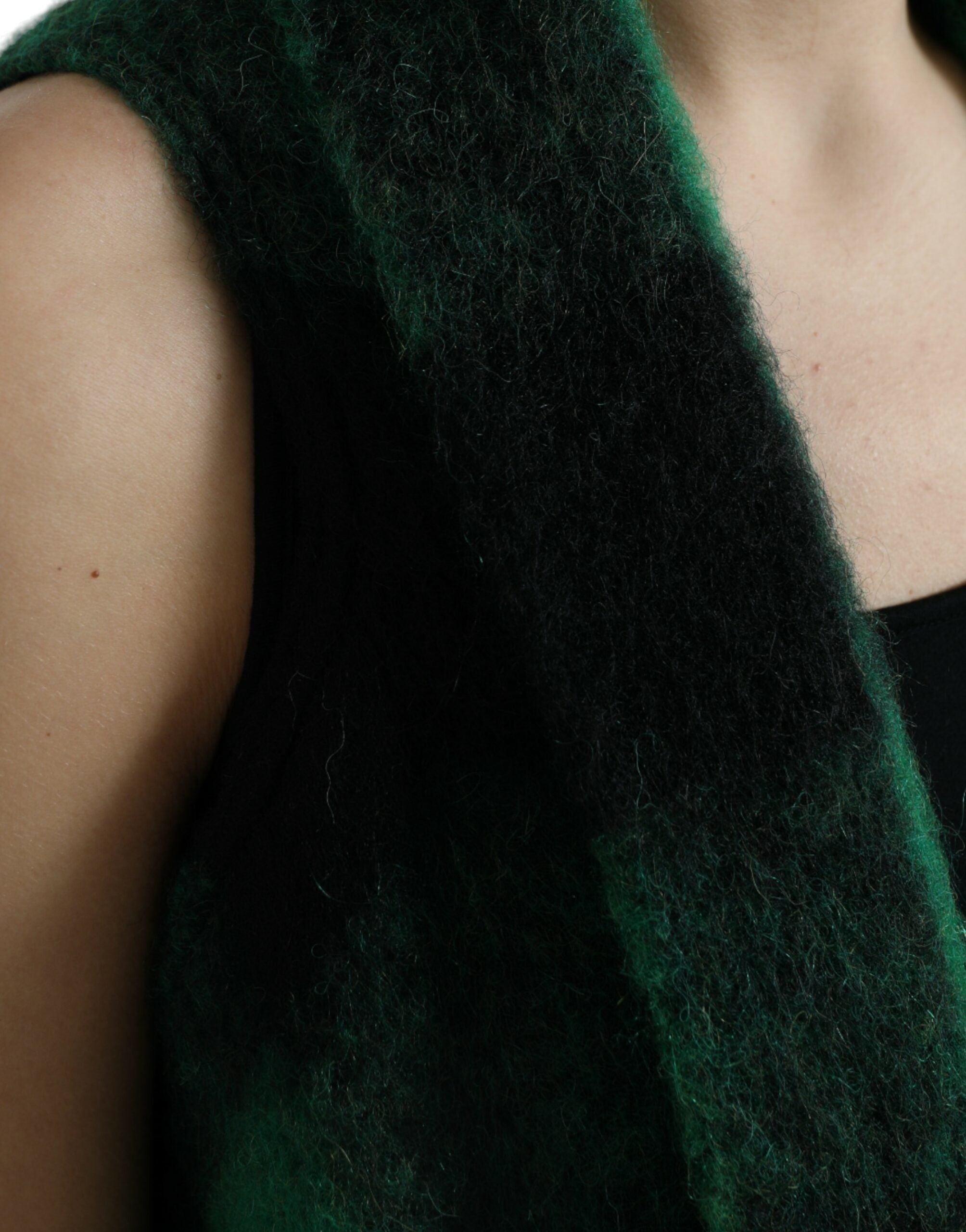 Black and green buffalo check poncho coat jacket by Dolce & Gabbana with a relaxed fit and classic plaid pattern.