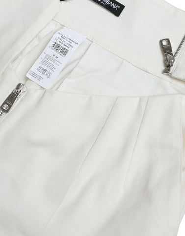 Black and white cotton tapered pants with cut-out waist from Dolce & Gabbana, featuring a stylish, modern design.