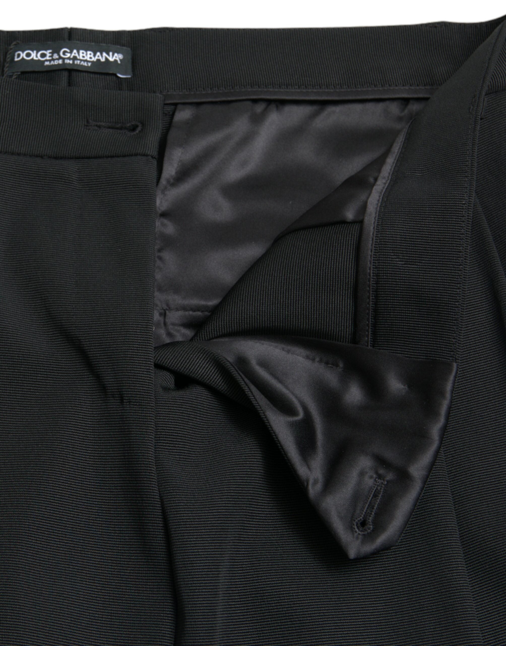 Black wool high waist cropped tapered pants by Dolce & Gabbana, showing the tailored fit and front view of the stylish design.