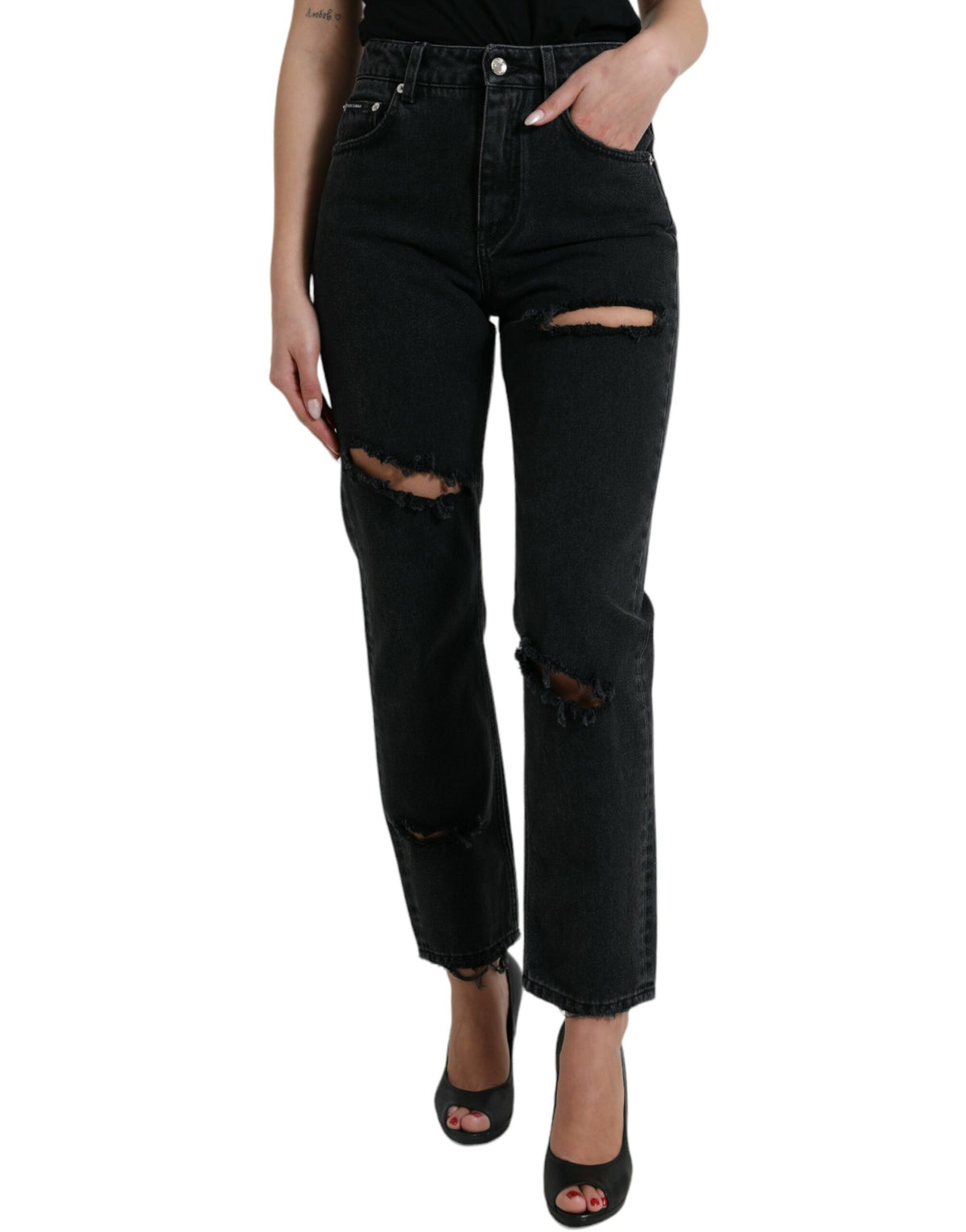 Black cotton high waist tattered denim jeans by Dolce & Gabbana, featuring distressed details and classic five-pocket design.