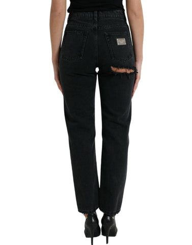 Black cotton high waist tattered denim jeans by Dolce & Gabbana, showing distressed details and classic five-pocket style.