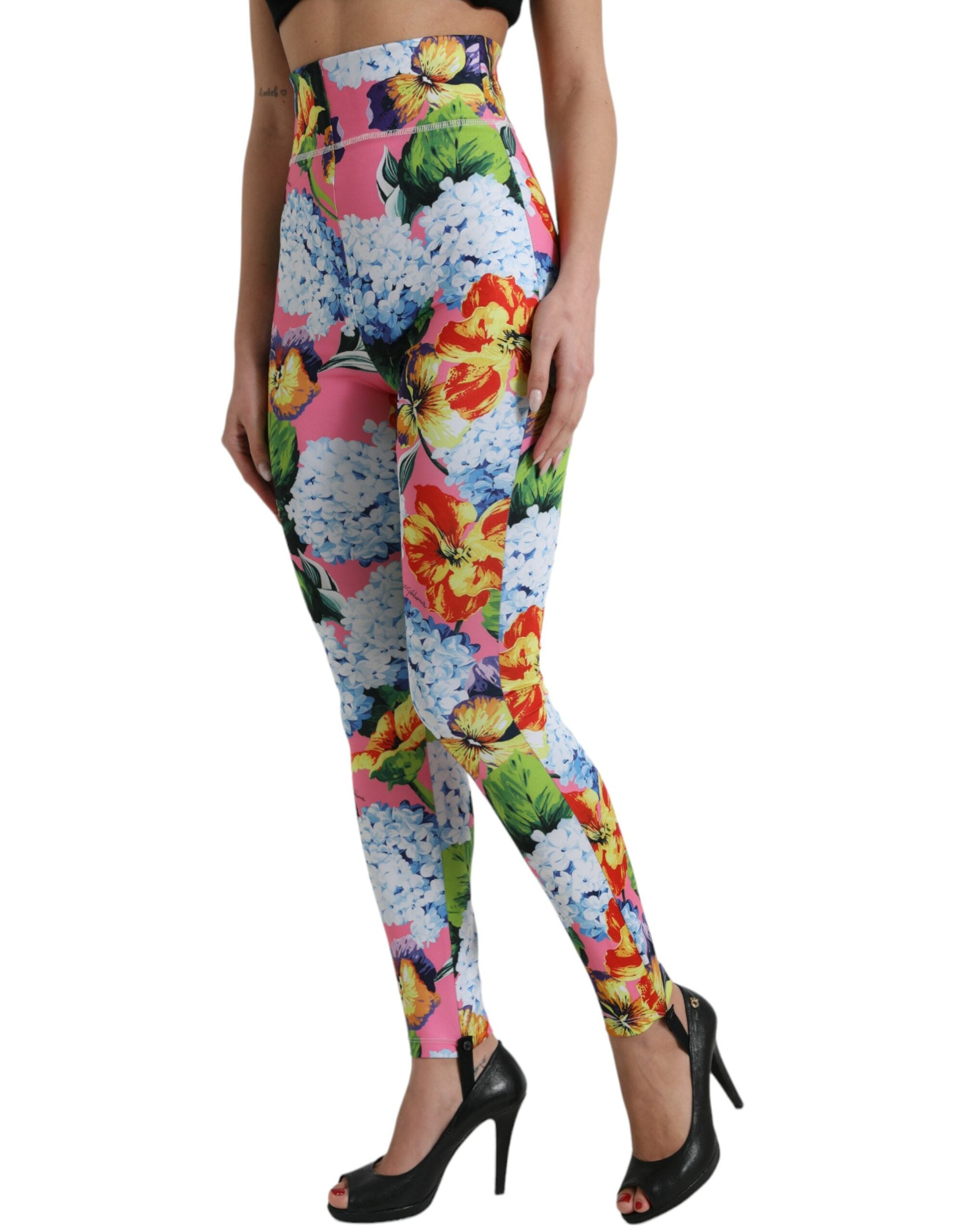 Multicolor floral high-waist leggings by Dolce & Gabbana, featuring vibrant floral patterns and a snug fit.