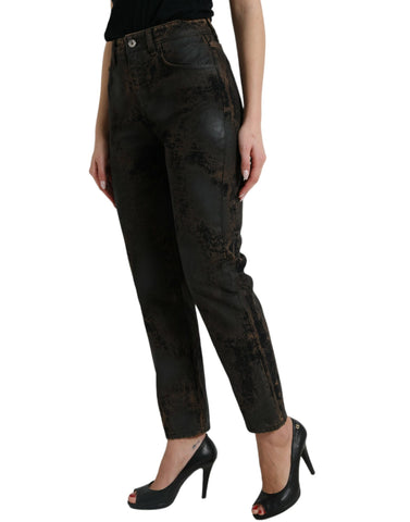 Brown Dolce & Gabbana boyfriend mid-waist cotton denim jeans displayed on a hanger.