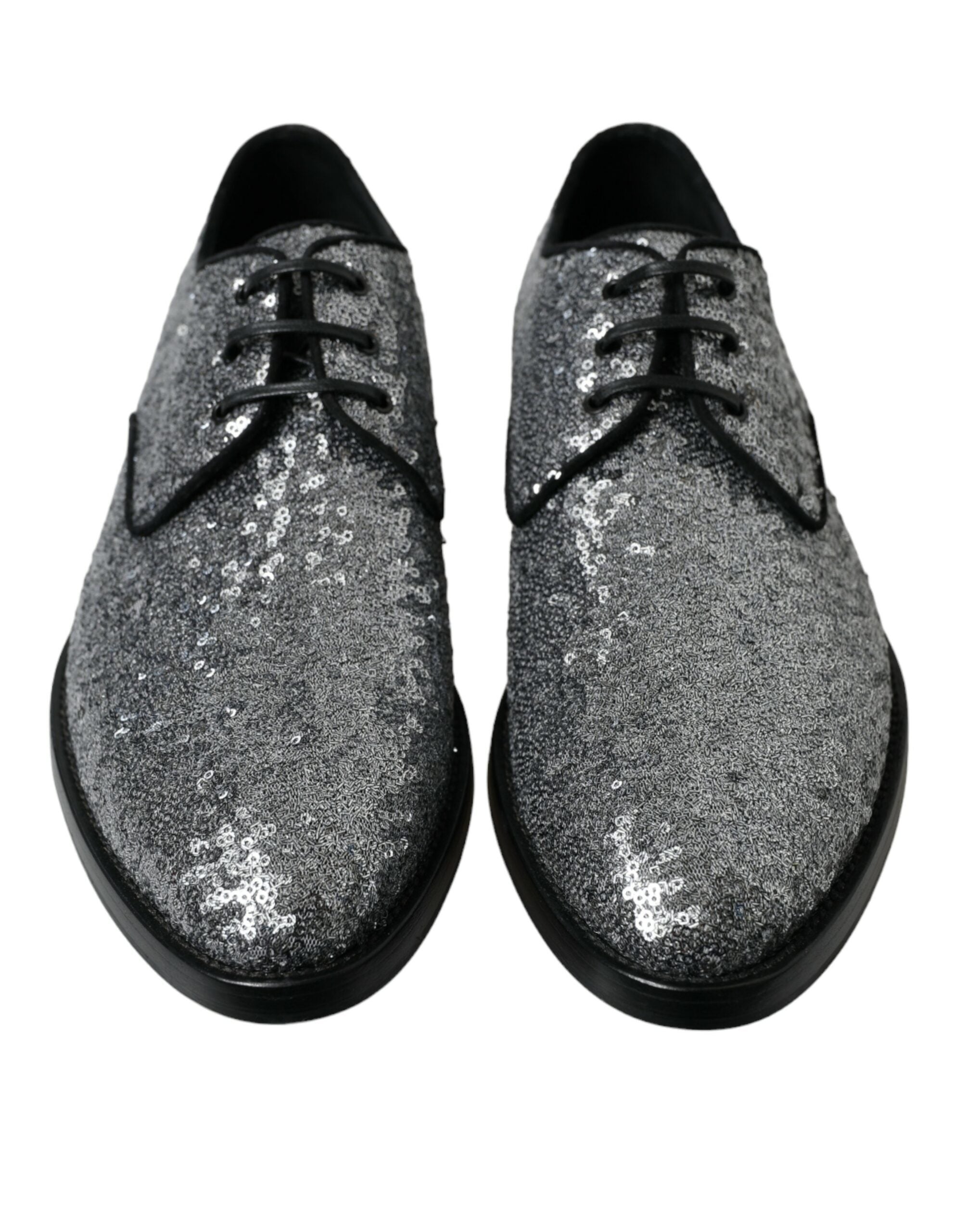 Silver sequined lace-up men's derby dress shoes by Dolce & Gabbana, featuring a shiny, stylish design with intricate detailing.