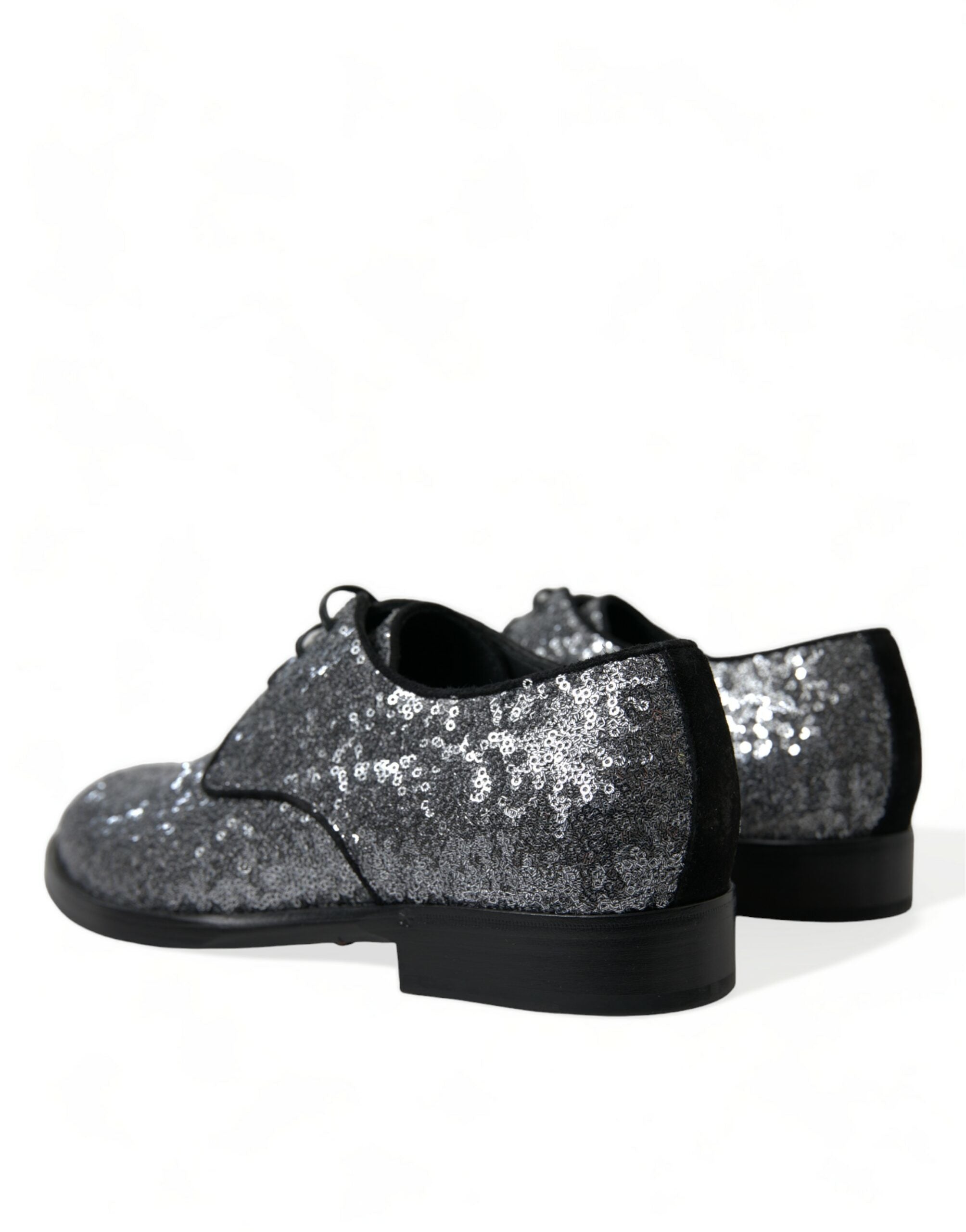Silver sequined lace-up men's derby dress shoes by Dolce & Gabbana with sleek design and shiny embellishments.