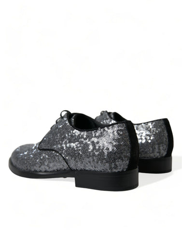 Silver sequined lace-up men's derby dress shoes by Dolce & Gabbana with sleek design and shiny embellishments.
