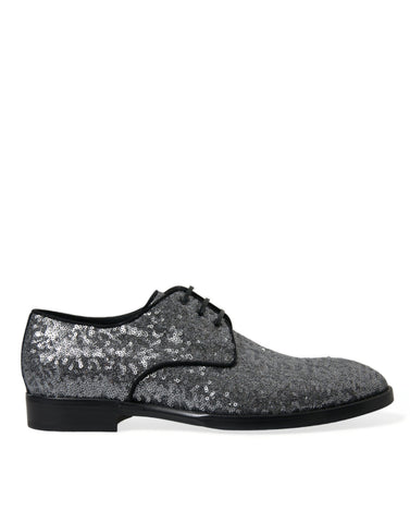 Silver sequined lace-up men's derby dress shoes by Dolce & Gabbana, featuring a shiny, stylish design with intricate detailing.