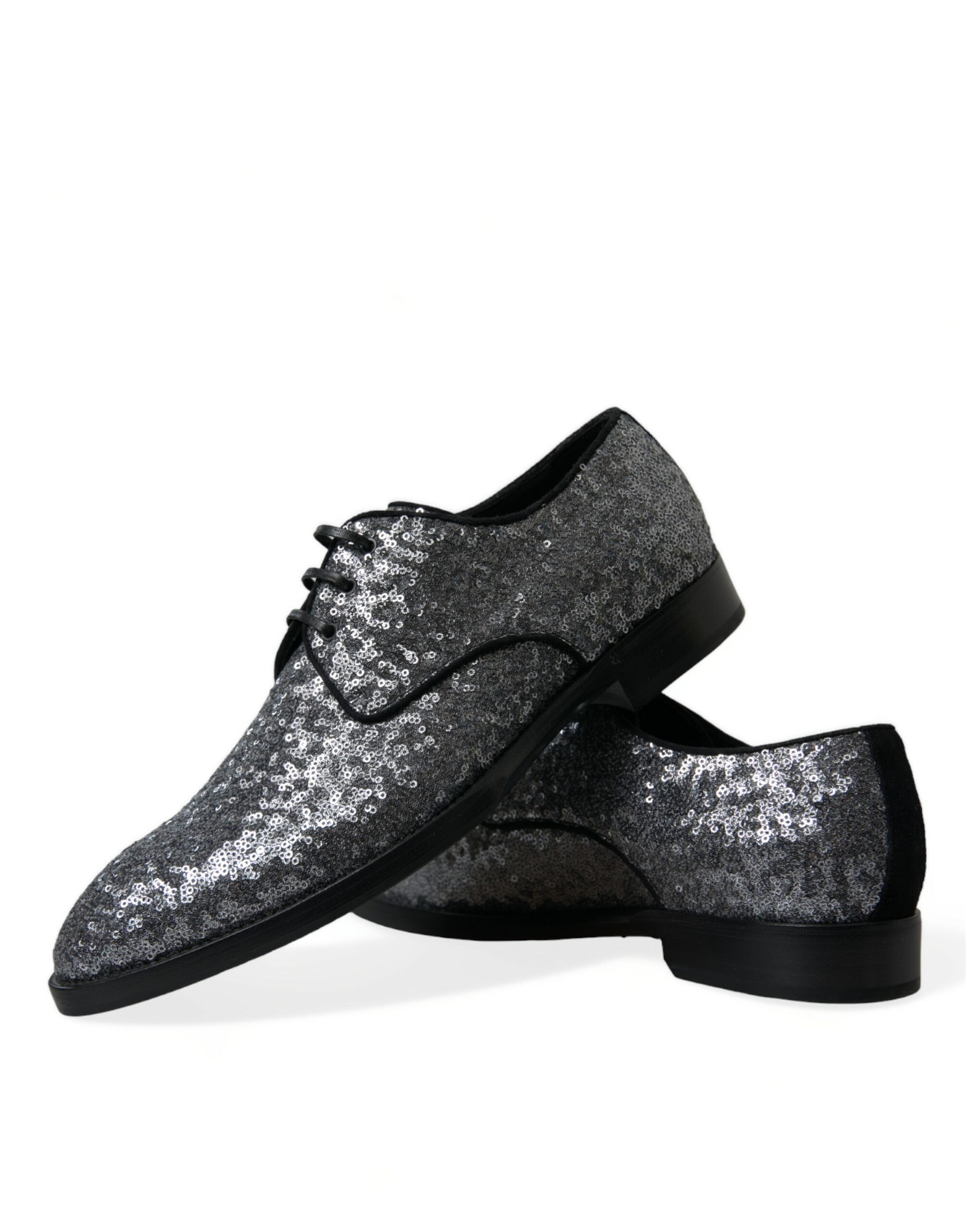 Silver sequined lace-up men's derby dress shoes by Dolce & Gabbana with a sleek, shiny finish and elegant design.