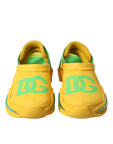 Yellow and green rubber clogs for men by Dolce & Gabbana, featuring slip-on slippers with a casual, comfortable design.