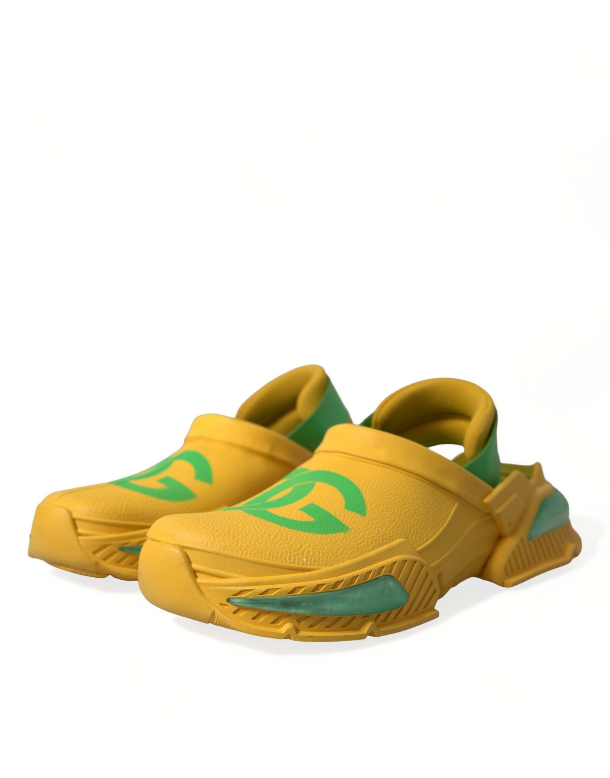 Yellow and green rubber clogs for men by Dolce & Gabbana, featuring slip-on design and casual slipper style.