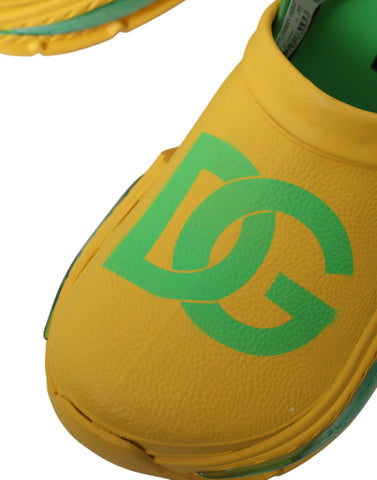 Yellow and green rubber clogs for men by Dolce & Gabbana, featuring slip-on design and casual footwear style.