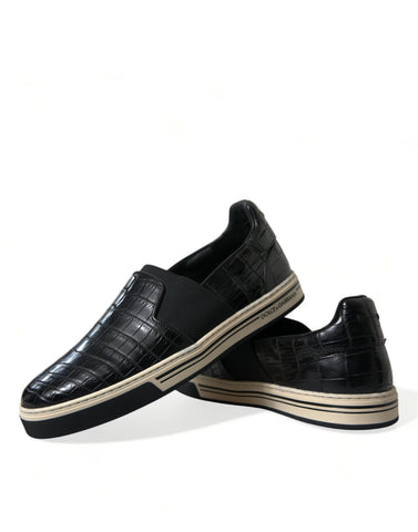 Black croc-embossed leather sneakers by Dolce & Gabbana, showcasing stylish exotic leather footwear with textured finish.
