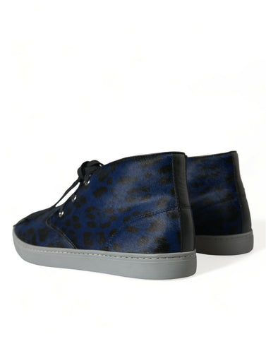 Blue calfskin leopard print mid-top sneakers from Dolce & Gabbana featuring stylish laces and a sleek design.